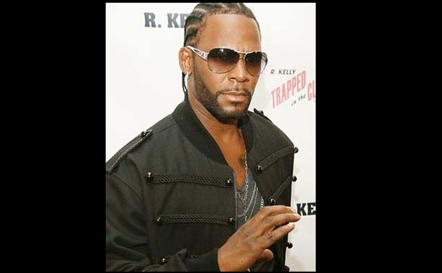 who raised singer r kelly